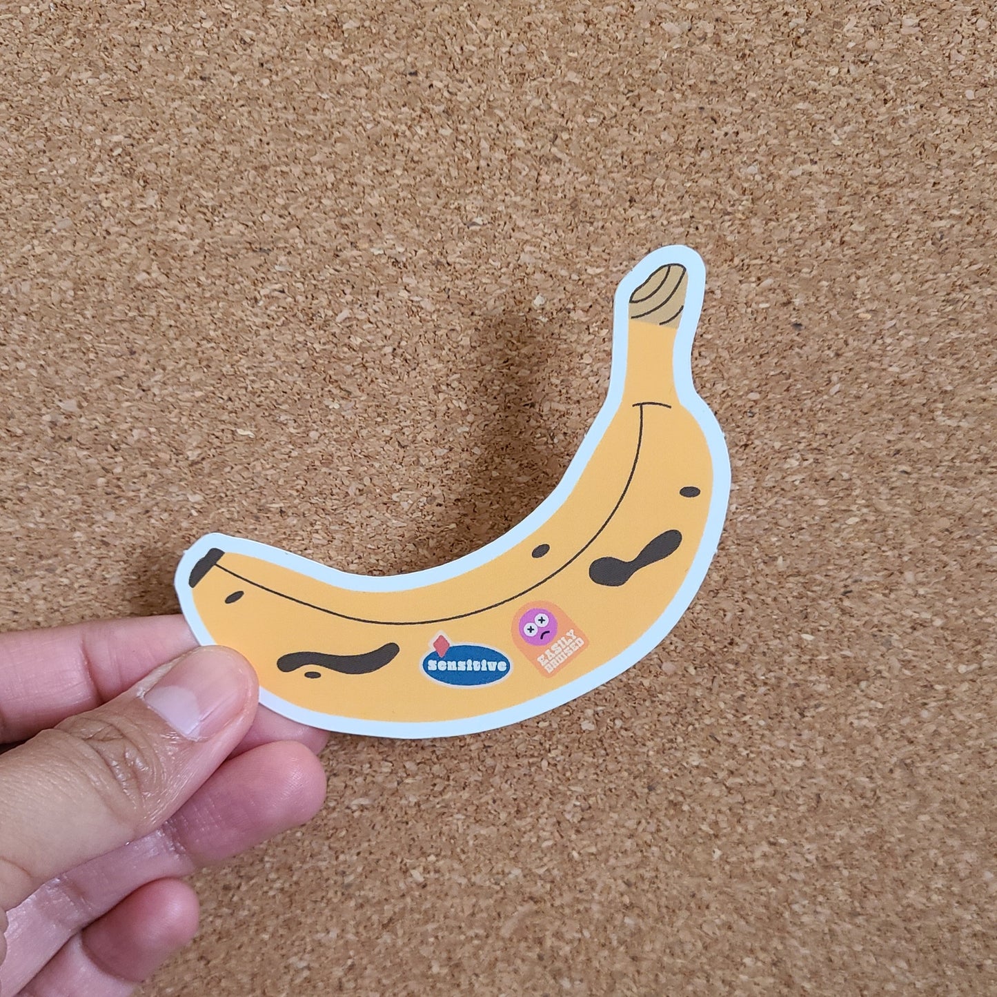 Cute emo banana sticker made in Canada by Mad Love Creative Co.
