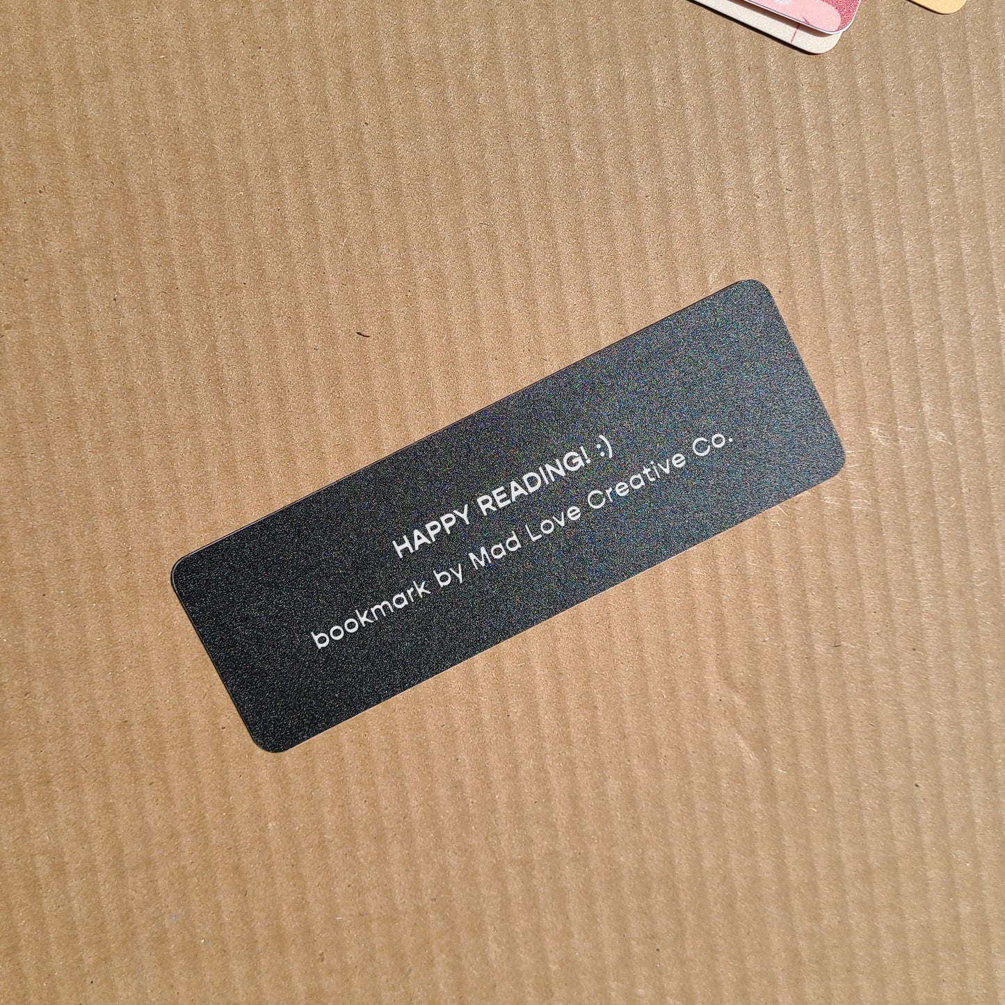 Back of bookmark by Mad Love Creative Co.