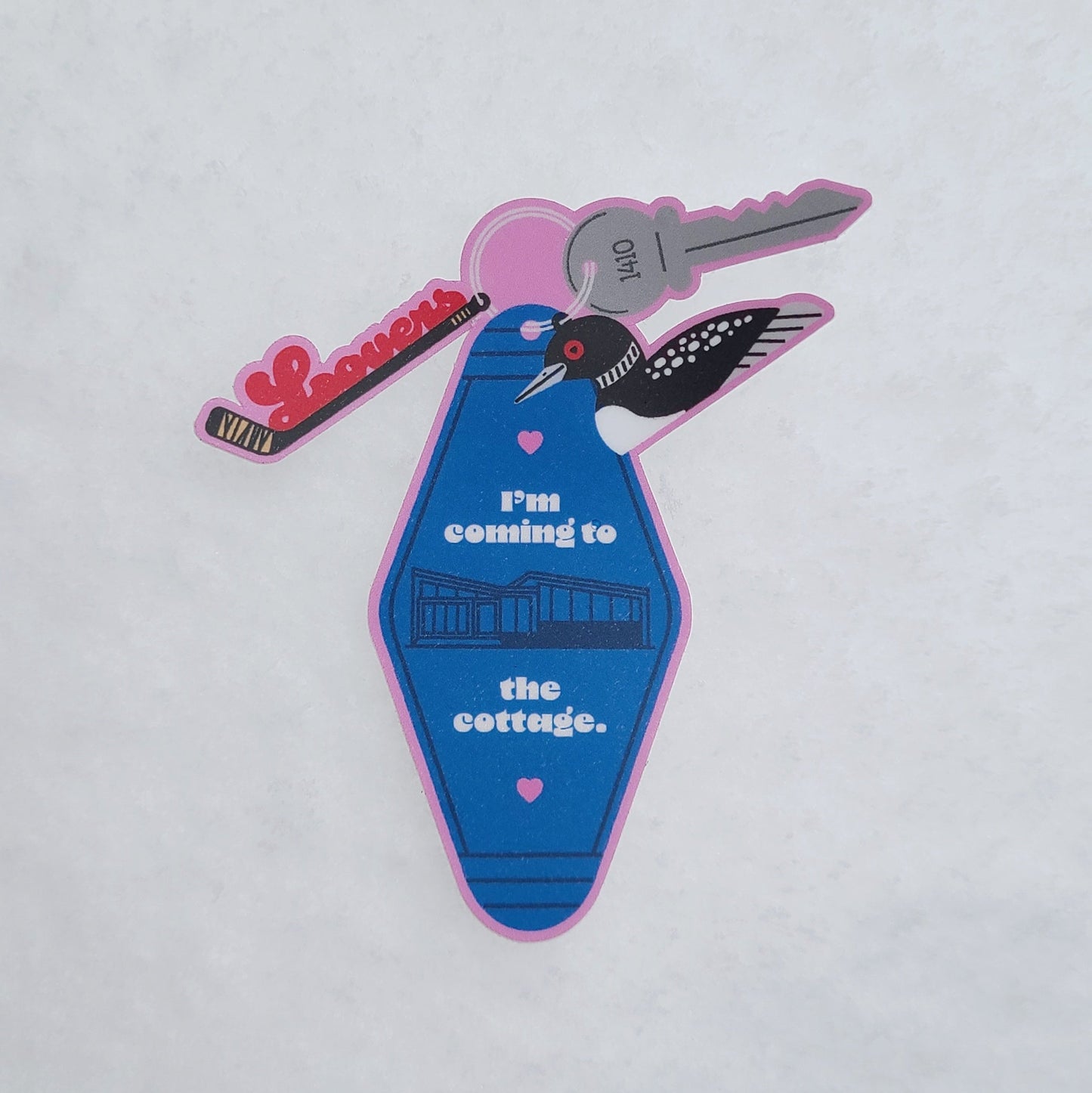 Cute sticker of a motel keychain with icons inspired by a Canadian hockey-themed LGBTQ TV show. Made in Canada by Mad Love Creative Co.