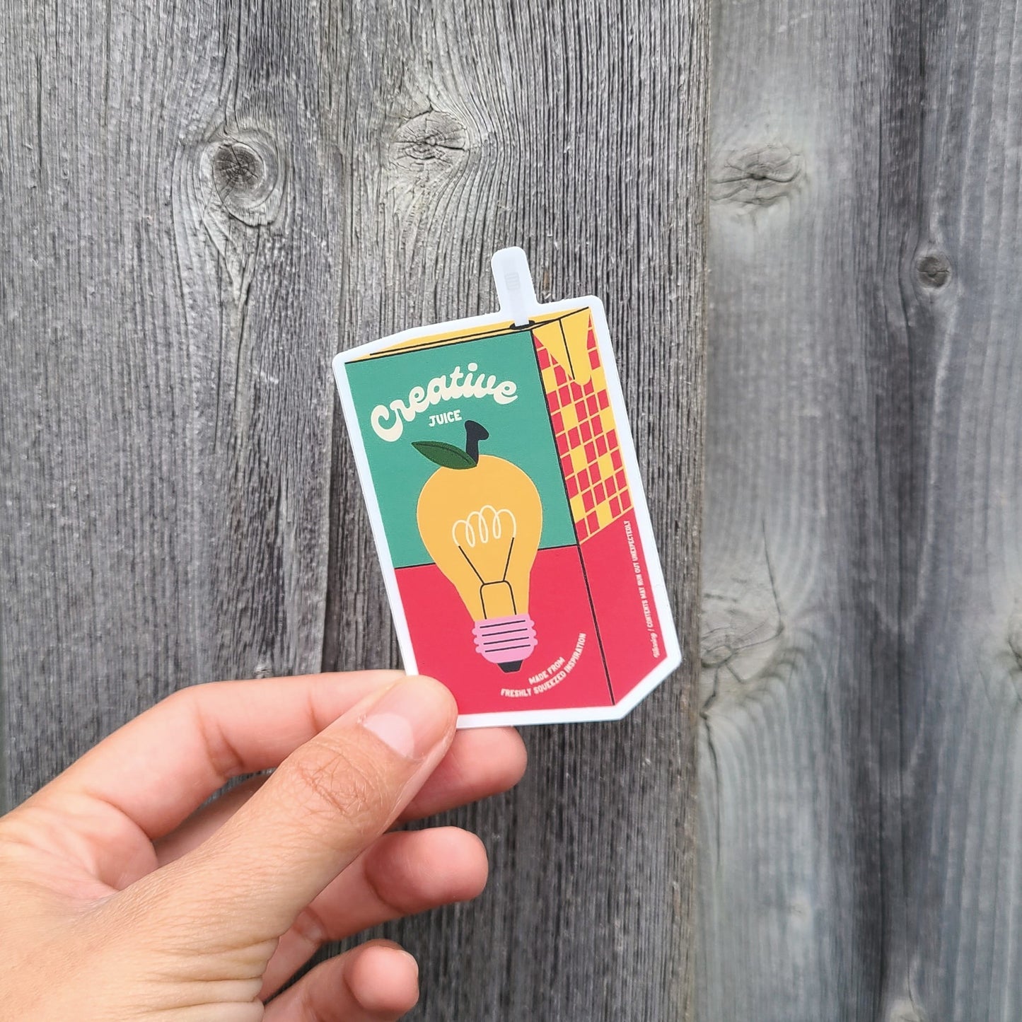 Cute vinyl juice box sticker with a lightbulb that says "Creative Juice". Made in Canada by Mad Love Creative Co.