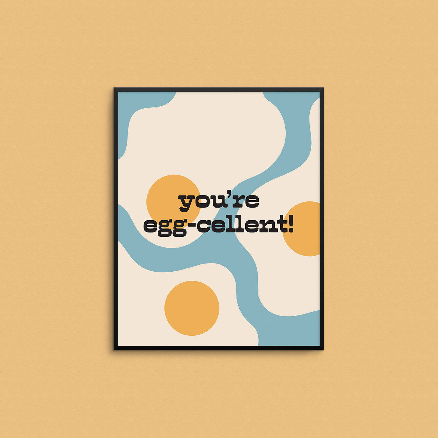 Cute kitchen print featuring sunny side up eggs with the phrase "you're egg-cellent". Made in Canada by Mad Love Creative Co.