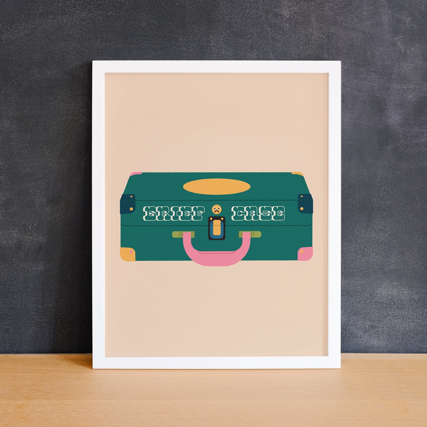 Funny emo print of a briefcase with a sad face and the text "grief case". Made in Canada by Mad Love Creative Co.