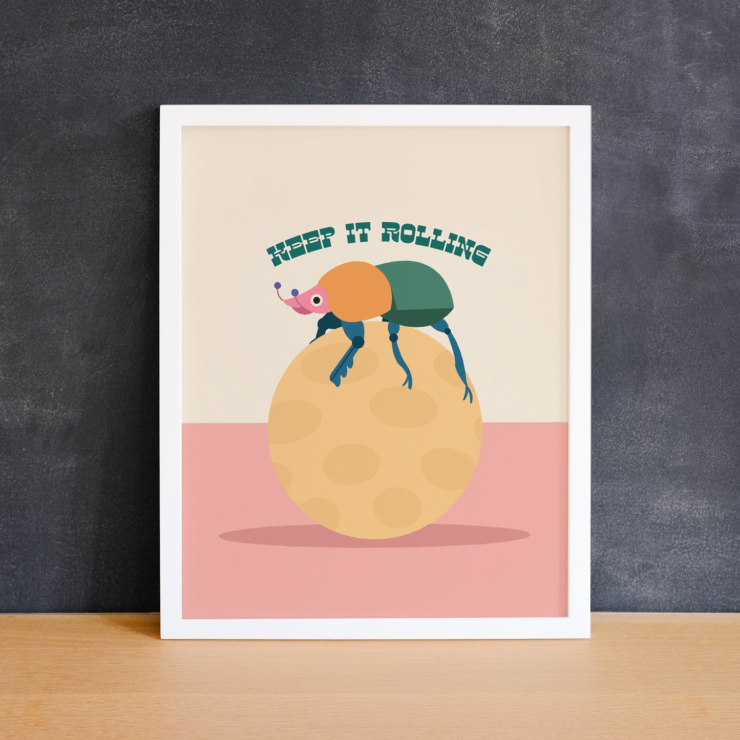 Colourful print of a dung beetle with the text "keep it rolling". Made in Canada by Mad Love Creative Co.