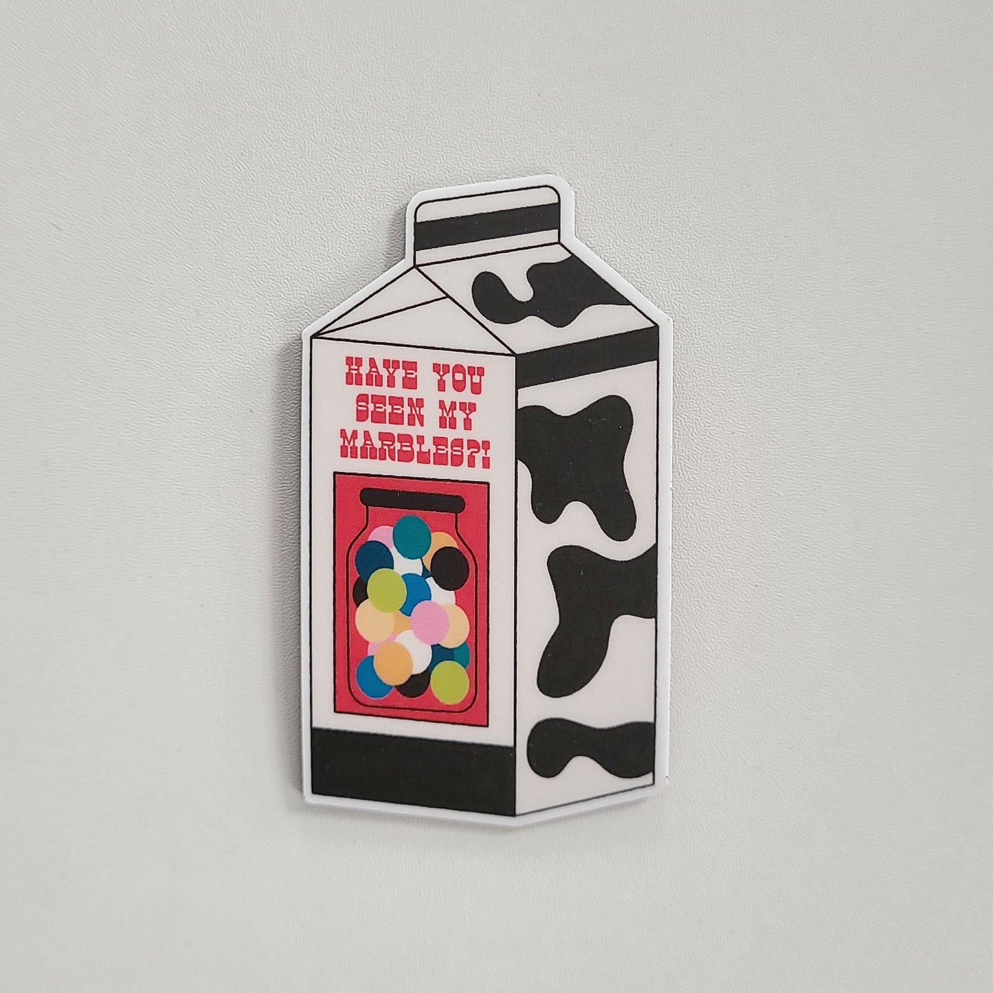 Cute fridge magnet of a milk carton with the text "have you seen my marbles". Made in Canada by Mad Love Creative Co.