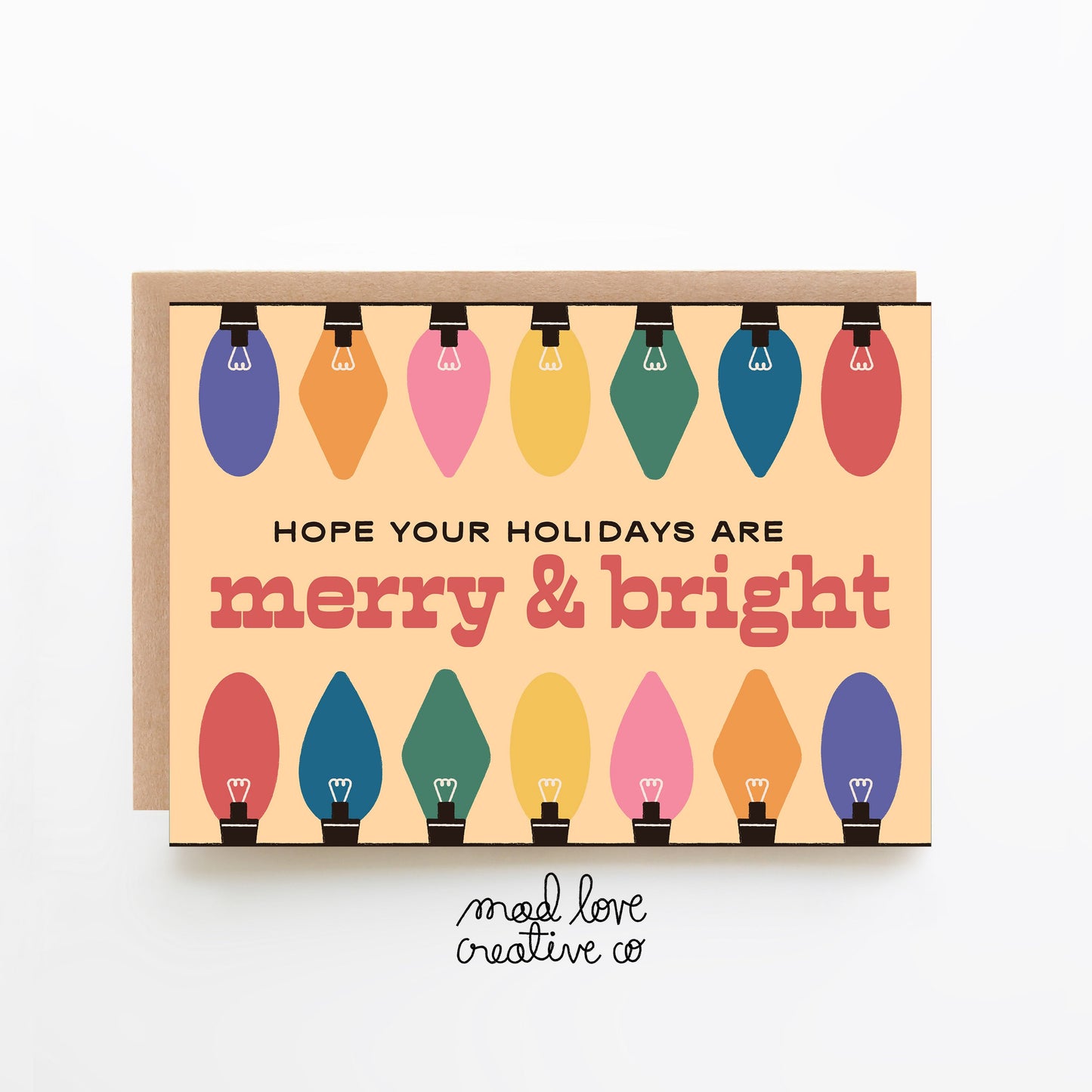 Cute Christmas lights card that says "hope your holidays are merry and bright". Made in Canada by Mad Love Creative Co.