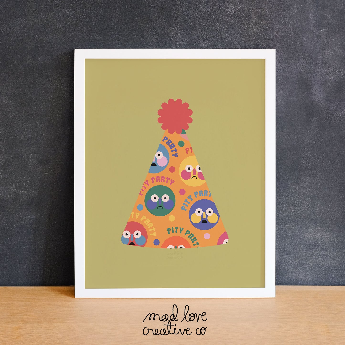 Colourful print of a party hat with a pattern of sad and surprised faces with the text "pity party". Made in Canada by Mad Love Creative Co.