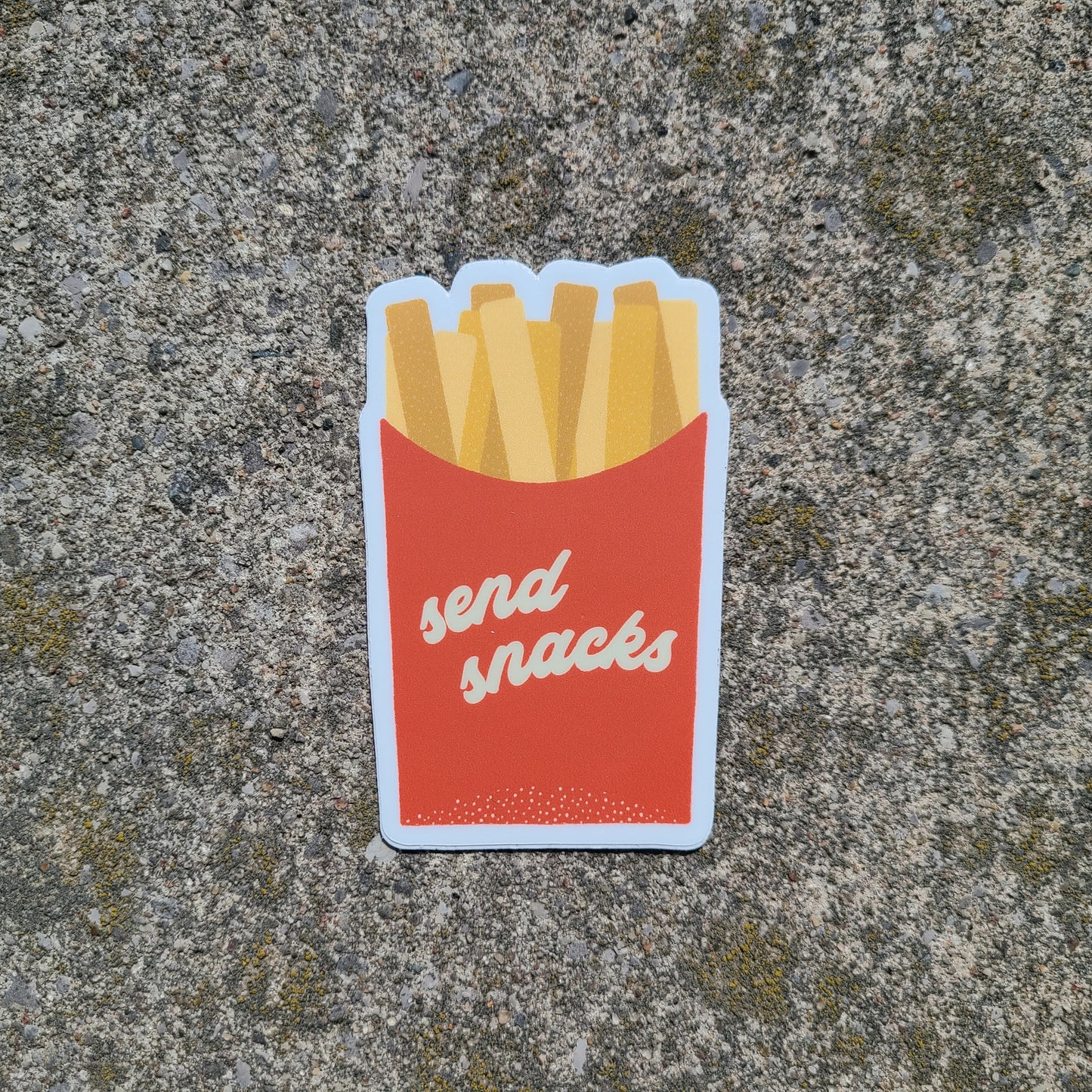 Cute sticker of an order of fries that says "Send Snacks" made in Canada by Mad Love Creative Co.