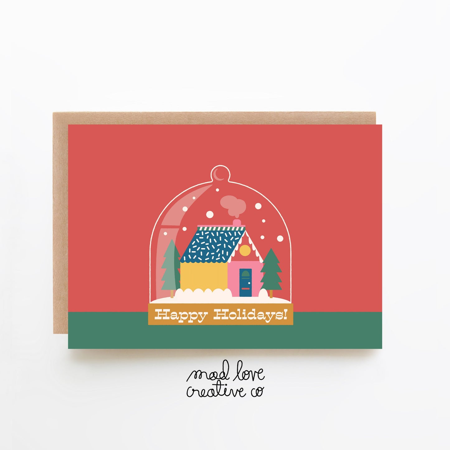 Cute holiday card of a snow globe with a cute house that says "happy holidays". Made in Canada by Mad Love Creative Co.
