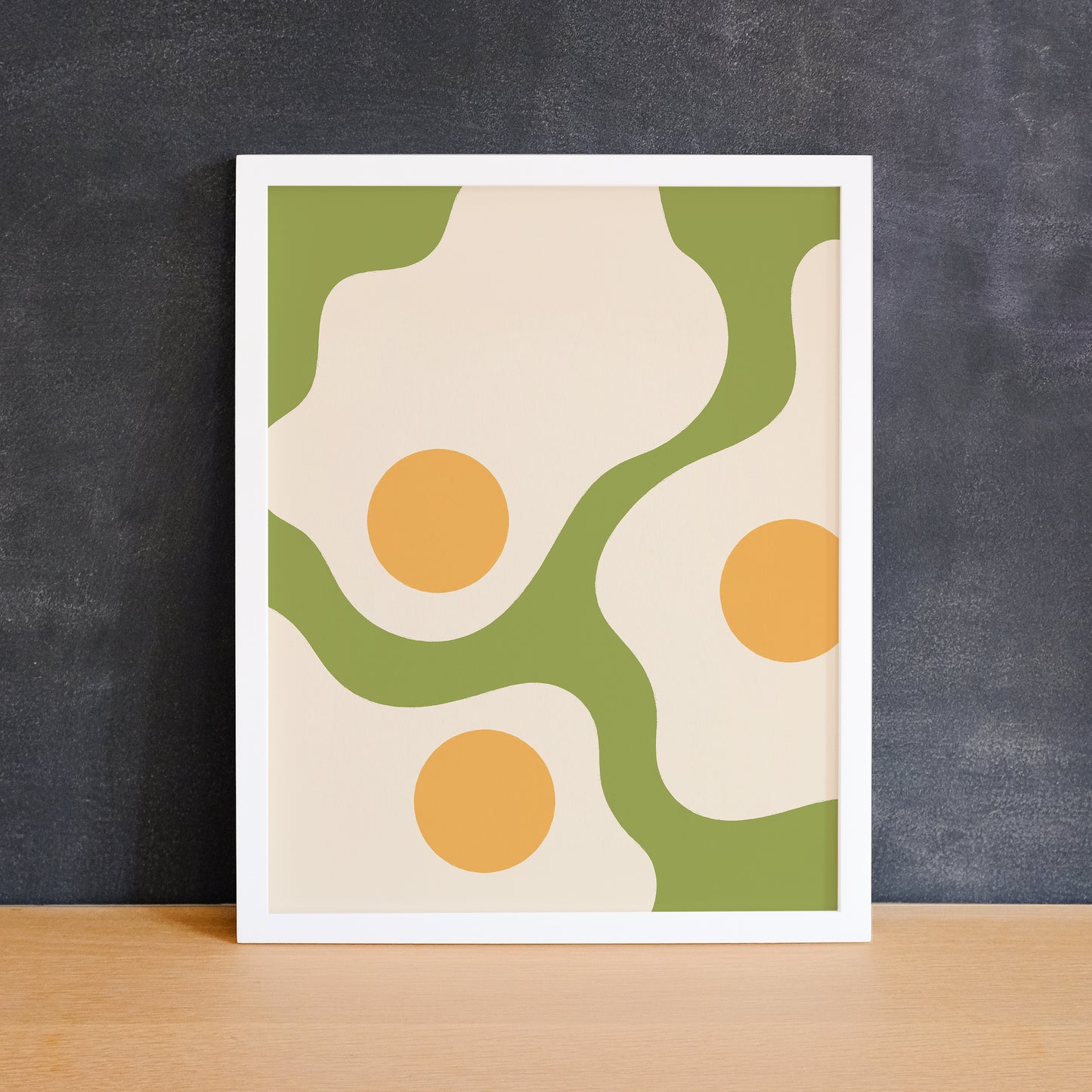 Illustration of sunny side up eggs on a green background. Made in Canada by Mad Love Creative Co.