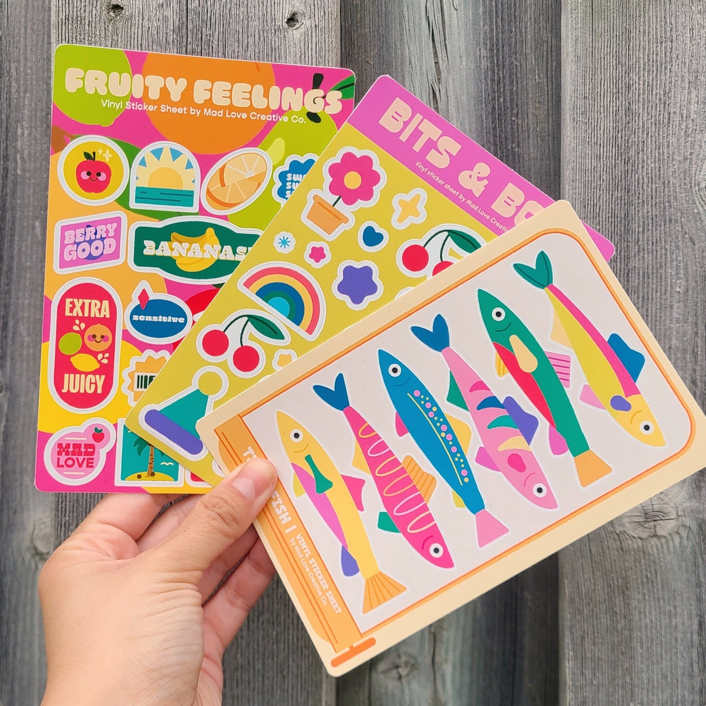 Assortment of vinyl sticker sheets. Made in Canada by Mad Love Creative Co.