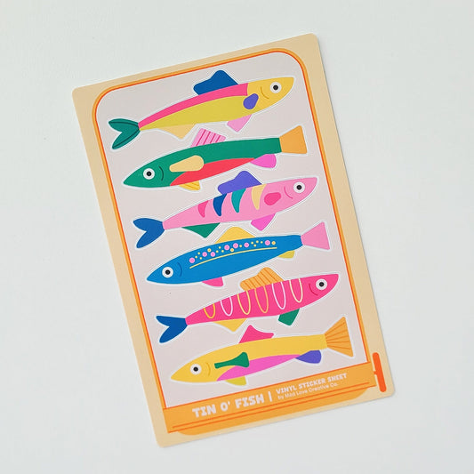 sticker sheet with colorful fish illustrations on a light gray background