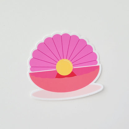 Colourful sticker of a pink oyster with a gold pearl. Made in Canada by Mad Love Creative Co. 