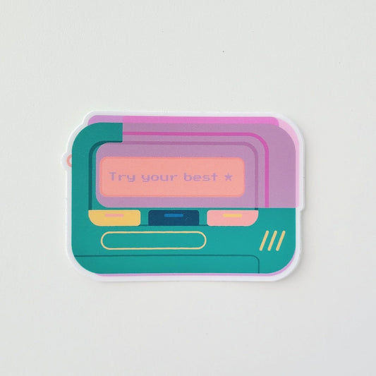 Colourful sticker of a retro beeper with the phrase "try your best". Made in Canada by Mad Love Creative Co. 