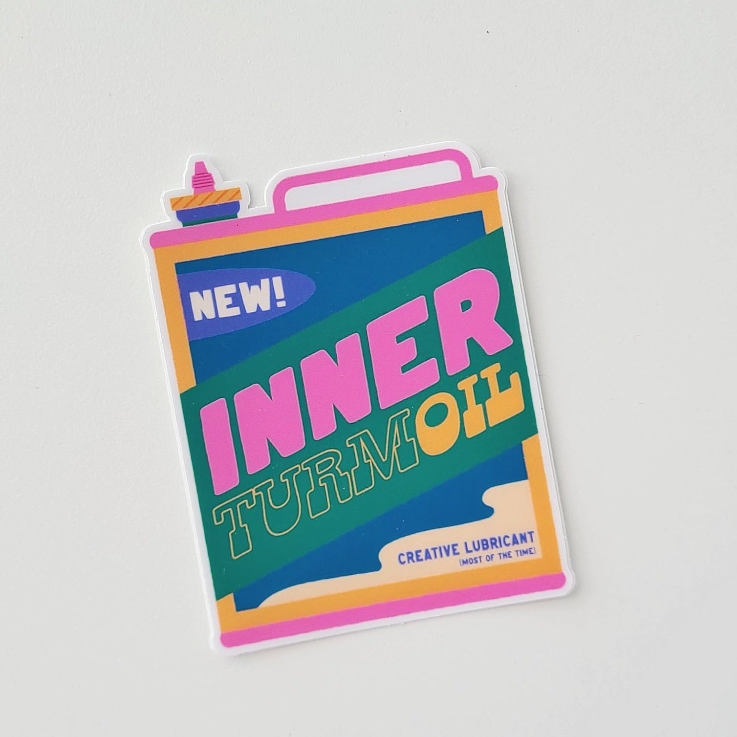 Funny sticker of a vintage oil can with the phrase "inner turmoil". Made in Canada by Mad Love Creative Co. 