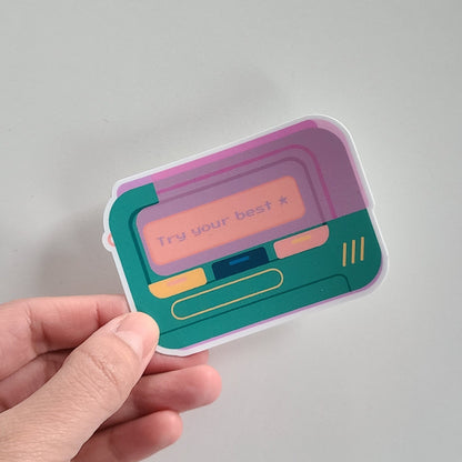 Cute vinyl sticker of a retro beeper pager with the text "try your best". Made in Canada by Mad Love Creative Co.