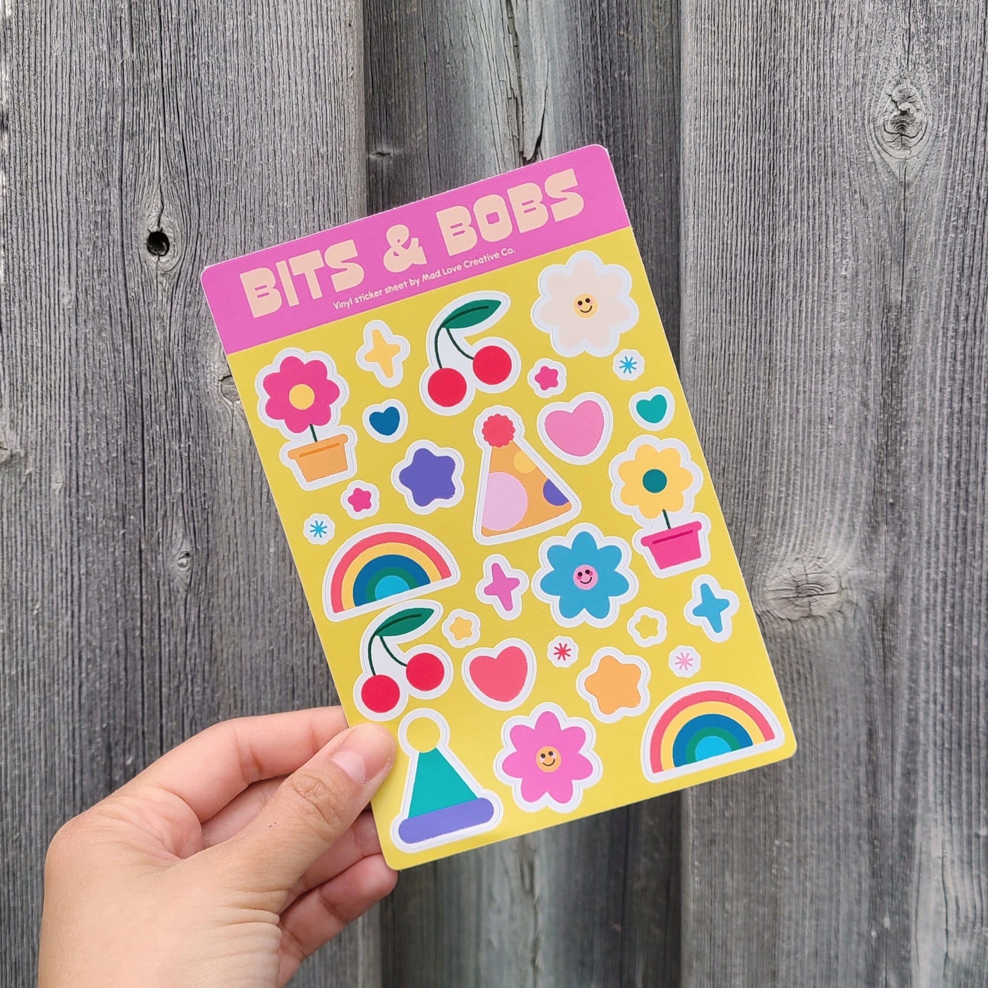 Cute vinyl sticker sheet featuring an assortment of symbols. Made in Canada by Mad Love Creative Co. 