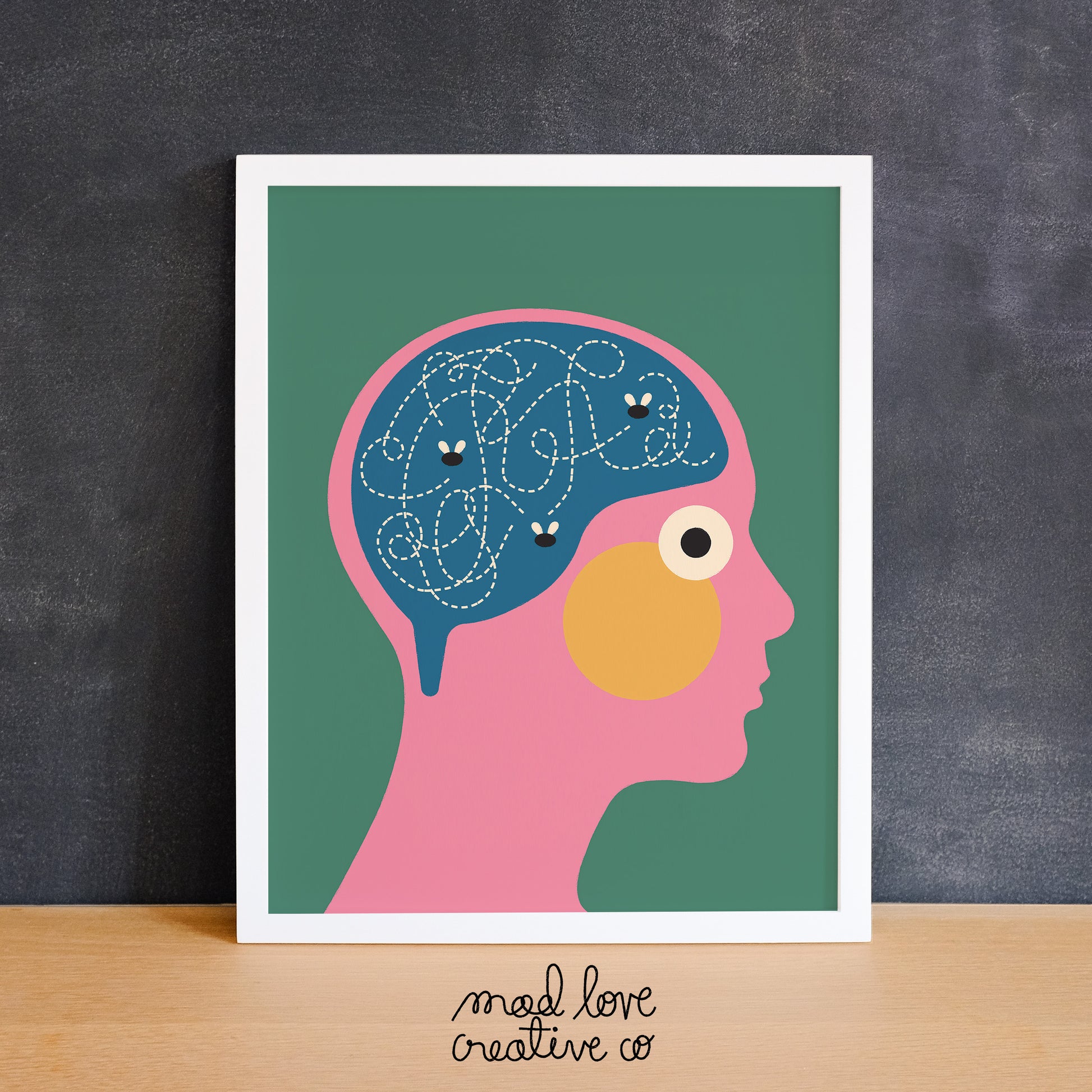 Funny print of a face with an open brain that has flies buzzing around it. Made in Canada by Mad Love Creative Co.