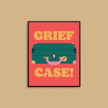 Framed artwork with a suitcase illustration and 'Grief Case!' text on a red background. Made in Canada by Mad Love Creative Co.