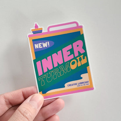 Funny vinyl sticker of an oil can with the text "inner turmoil". Made in Canada by Mad Love Creative Co. 
