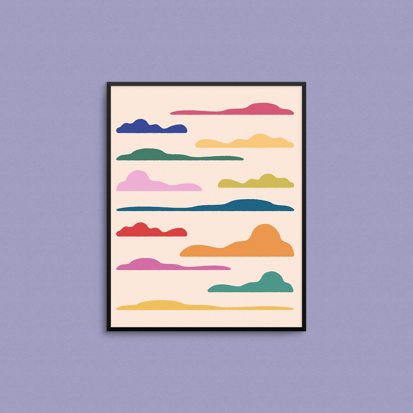 Framed artwork mockup with colorful cloud shapes on a purple wall. Made in Canada by Mad Love Creative Co. 