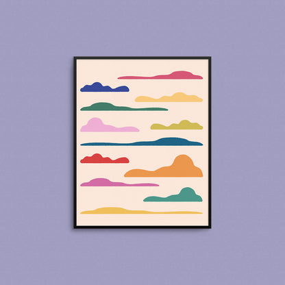 Framed artwork mockup with colorful cloud shapes on a purple wall. Made in Canada by Mad Love Creative Co. 