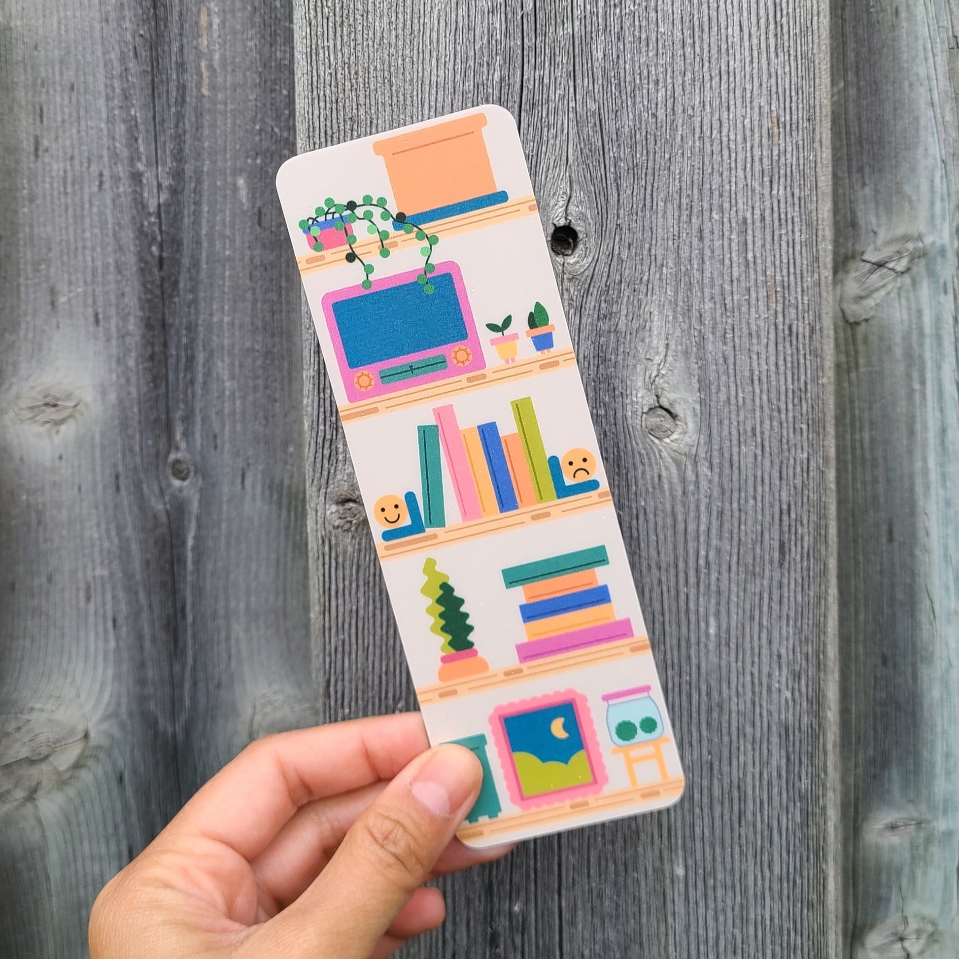Cute bookmark featuring an aesthetic shelf display. Made in Canada by Mad Love Creative Co. 