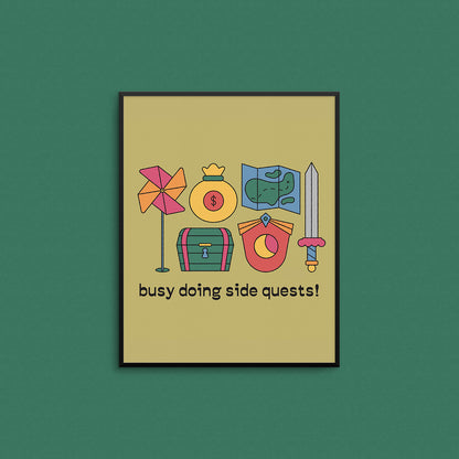 Print featuring video game elements and the text "busy doing side quests". Made in Canada by Mad Love Creative Co.