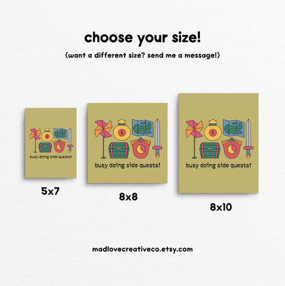 Print featuring video game elements and the text "busy doing side quests". Made in Canada by Mad Love Creative Co.