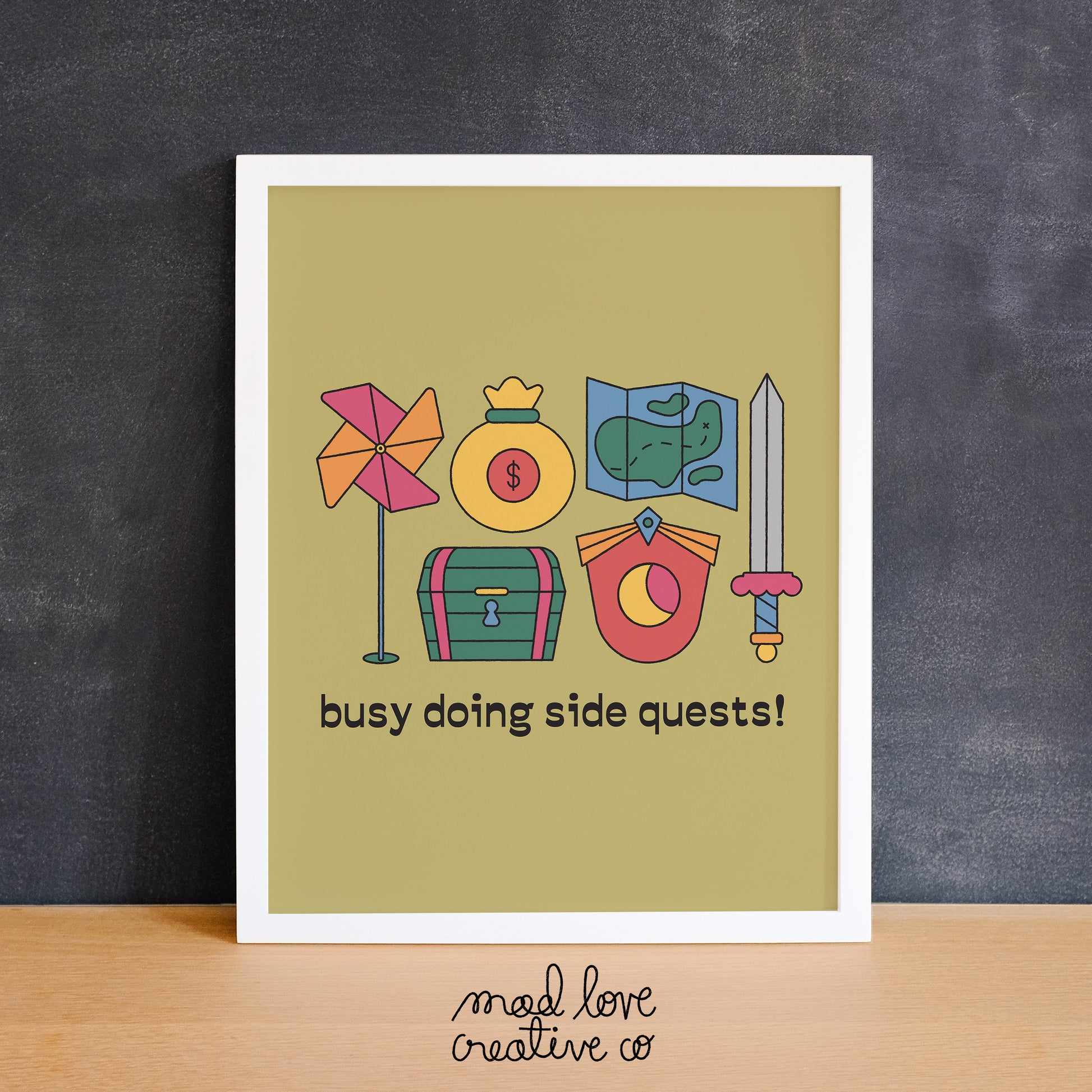 Print featuring video game elements and the text "busy doing side quests". Made in Canada by Mad Love Creative Co.