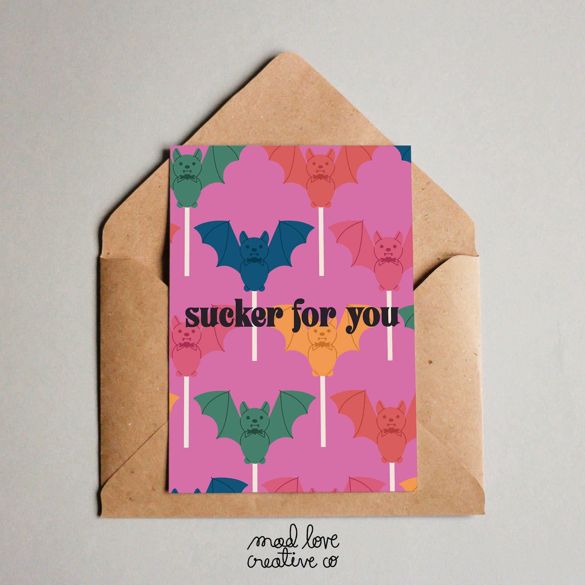 Cute love card with bat lollipops that says "sucker for you". Made in Canada by Mad Love Creative Co. 